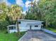 Beautiful two-story home with a well manicured lawn at 1630 Lakeview Ct, Eustis, FL 32726