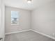 Neutral bedroom with large window and plush carpeting at 16526 Silver Brook Way, Winter Garden, FL 34787