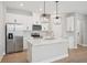 Well-appointed kitchen with quartz counters and stainless steel appliances at 16526 Silver Brook Way, Winter Garden, FL 34787