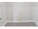 Walk-in closet featuring carpet floors and white, wire shelving at 16526 Silver Brook Way, Winter Garden, FL 34787