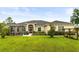 Beautiful single story home with a screened in lanai and well manicured landscaping at 18920 Overton St, Orlando, FL 32833