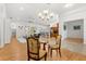 Spacious living room featuring wood floors, lots of natural light, and an open floor plan at 18920 Overton St, Orlando, FL 32833