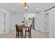 Eat-in dining area with white walls, wooden floors and a wood table with chairs at 1921 Dartmouth Ave, Winter Park, FL 32789