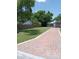 Charming single-story home featuring manicured lawn and brick-paved walkway leading to the entrance at 1921 Dartmouth Ave, Winter Park, FL 32789