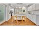 Bright kitchen features a butcher block island, pendant lights, and white cabinets at 1930 Aster Dr, Winter Park, FL 32792