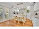 Bright kitchen features a butcher block island, pendant lights, and white cabinets at 1930 Aster Dr, Winter Park, FL 32792