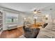 Comfortable living room with views of the kitchen and backyard at 1930 Aster Dr, Winter Park, FL 32792