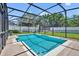 The sparkling screened pool offers a refreshing retreat in this private backyard oasis, perfect for relaxation at 1930 Aster Dr, Winter Park, FL 32792