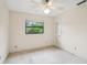Bedroom featuring ceiling fan and a window providing natural light at 2020 Cocos Ct, Winter Park, FL 32792