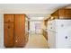 Kitchen featuring wood cabinets, and an eat-in area at 2020 Cocos Ct, Winter Park, FL 32792