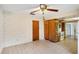 Kitchen area features wood cabinets, tiled flooring and a ceiling fan at 2020 Cocos Ct, Winter Park, FL 32792
