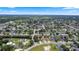 Aerial view of the community featuring well-kept lawns, houses, and neighborhood streets at 2305 Ascot Ave, Orlando, FL 32833