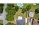 Aerial view of a property featuring a spacious yard, RV parking, and neighboring pool at 2305 Ascot Ave, Orlando, FL 32833