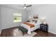 Comfortable bedroom with a ceiling fan, window, and decor creating a cozy and inviting space at 2305 Ascot Ave, Orlando, FL 32833
