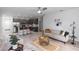 Open-concept living room connecting to the kitchen, creating a spacious and inviting atmosphere at 2305 Ascot Ave, Orlando, FL 32833