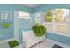 Fresh bathroom showcasing glass enclosed shower, white vanity, arched window, and ample natural light at 2440 Pawtucket Pass, Mount Dora, FL 32757