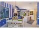 Open-concept space with a dining area that flows into the kitchen and living area at 2440 Pawtucket Pass, Mount Dora, FL 32757