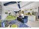Spacious living area flows into the kitchen and dining spaces, perfect for entertaining at 2440 Pawtucket Pass, Mount Dora, FL 32757