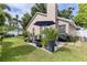 Outdoor patio in a large backyard with lush landscaping at 2737 Cahill Way, Lake Mary, FL 32746
