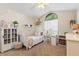 Comfortable bedroom with a large window and a cozy decor at 2737 Cahill Way, Lake Mary, FL 32746