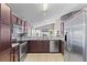 Well-equipped kitchen with stainless steel appliances and ample counter space at 2737 Cahill Way, Lake Mary, FL 32746