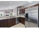 Well-equipped kitchen featuring stainless steel appliances and beautiful countertops at 2737 Cahill Way, Lake Mary, FL 32746
