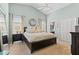Spacious main bedroom with vaulted ceilings and large windows at 2737 Cahill Way, Lake Mary, FL 32746