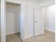 Bedroom closet featuring a deep storage area with adjustable shelving for optimal organization at 3141 Cashmere Dr, Orlando, FL 32827