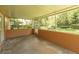 Spacious screened-in lanai offers a seamless transition to the backyard, perfect for relaxation and entertaining at 3141 Cashmere Dr, Orlando, FL 32827