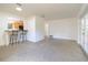 Open living area with bar and outside access at 3141 Cashmere Dr, Orlando, FL 32827