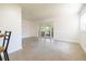 Bright and airy living area with sliding glass doors at 3141 Cashmere Dr, Orlando, FL 32827