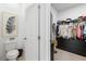 Spacious walk-in closet with built-in shelving and ample storage space at 3279 Canna Lily Pl, Clermont, FL 34711