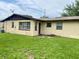 Spacious backyard with green grass, perfect for outdoor activities at 4394 Prince Hall Blvd, Orlando, FL 32811