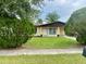 Traditional-style home with a neat front yard and curb appeal at 4394 Prince Hall Blvd, Orlando, FL 32811