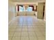 Spacious living room with tile flooring, chandelier lighting and ample natural light at 4394 Prince Hall Blvd, Orlando, FL 32811