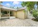 Backyard brick patio featuring steps up to the porch and yard at 4509 Belkin Ct, Orlando, FL 32814