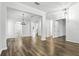 Bright living room showcasing wood floors, neutral paint, and open design, creating a welcoming and stylish atmosphere at 4509 Belkin Ct, Orlando, FL 32814