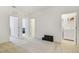 Spacious bedroom with neutral carpet, includes a laundry room, and two other rooms at 452 Diamond Dove Cv, Winter Springs, FL 32708