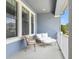 Inviting porch with comfortable seating, perfect for enjoying the outdoors and relaxing in style at 452 Diamond Dove Cv, Winter Springs, FL 32708