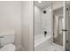 Modern bathroom featuring marble tile in tub, and modern fixtures at 4714 Abaca St, Orlando, FL 32808