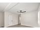 Bright bedroom featuring ceiling beams, ceiling fan, and natural light streaming through the windows at 4714 Abaca St, Orlando, FL 32808