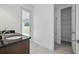 Bathroom featuring double vanity and access to backyard at 5204 Obsidian Gate Dr, Mount Dora, FL 32757