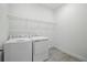 Practical laundry area with modern washer and dryer units at 5204 Obsidian Gate Dr, Mount Dora, FL 32757