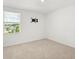 Bedroom with wall-mounted tv bracket and natural light at 5226 Mahogany Dr, Mount Dora, FL 32757