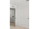 Laundry room with washer and dryer hookups and door at 5226 Mahogany Dr, Mount Dora, FL 32757