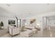 Inviting living room with tile flooring, neutral furniture, and modern decor at 5226 Mahogany Dr, Mount Dora, FL 32757