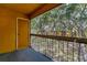 Enjoy the trees from this outdoor patio and deck at 5263 Images Cir # 306, Kissimmee, FL 34746