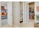 Hallway views to bathroom, closet, and bedroom showcasing the home's functional layout and design at 5310 Teirgarten St, St Cloud, FL 34771