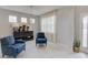 Bright living room showcasing stylish furnishings, neutral flooring, and lots of natural light at 5310 Teirgarten St, St Cloud, FL 34771