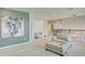 Bright loft with comfy seating, stylish artwork, and seamless access to additional rooms at 5310 Teirgarten St, St Cloud, FL 34771